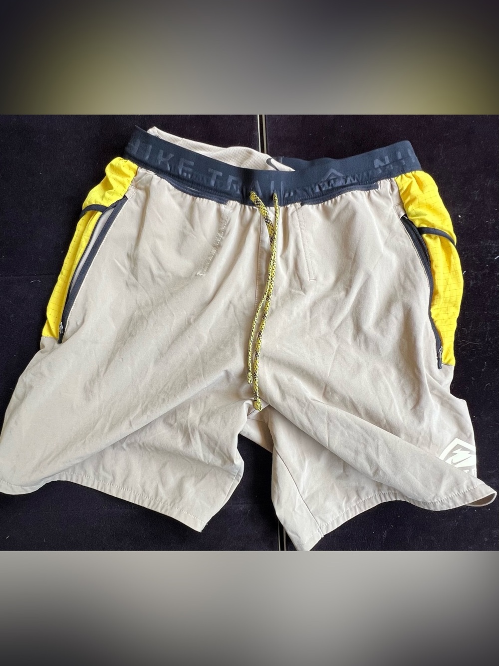 Nike trail Light Gray Shorts with Yellow Side Panels size small